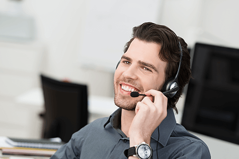 bigstock-Businessman-Using-A-Headset-57727742